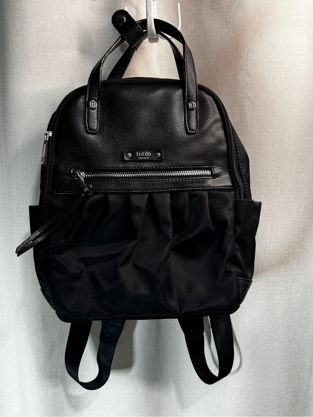 Tutilo New York Black Backpack Top Handle Zip Silver Hardware Small Front Pleats